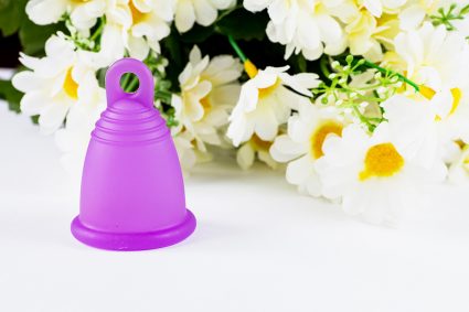 Menstrual cup and flowers